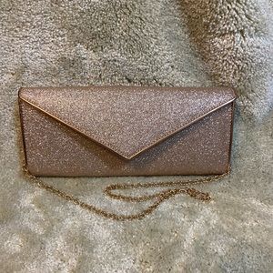 Gold glitter formal handbag.